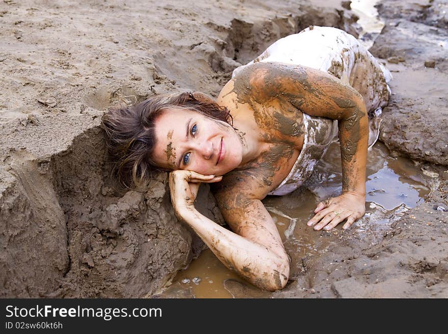 No longer a bride trashing her dress in the mud. She is happy to get it dirty. No longer a bride trashing her dress in the mud. She is happy to get it dirty.