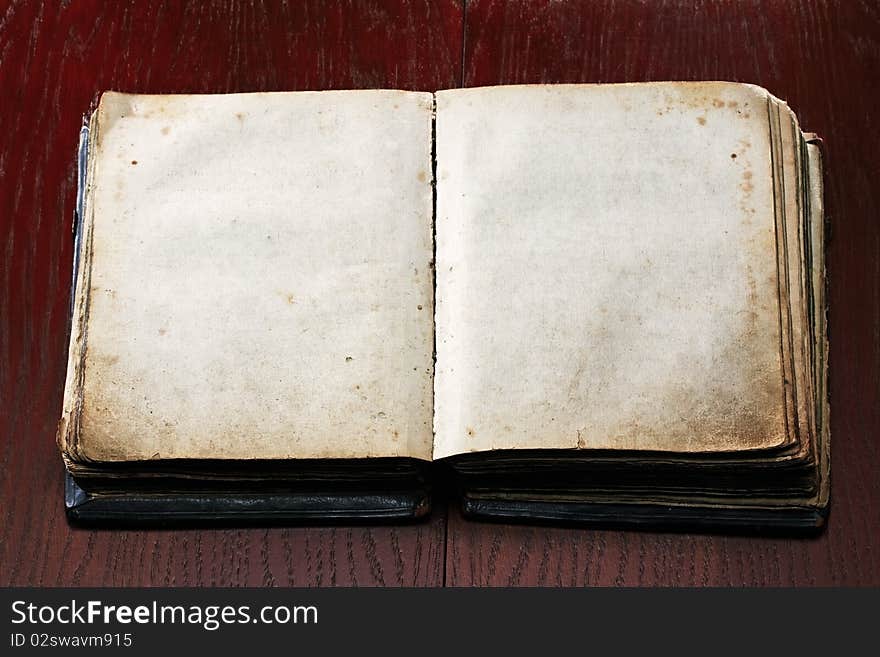 Old book on wooden table. Old book on wooden table