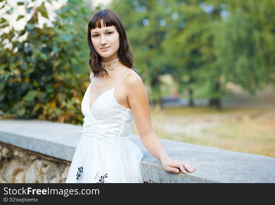 Portrait of naturally beautiful woman in her twenties, shot outside in natural sunlight