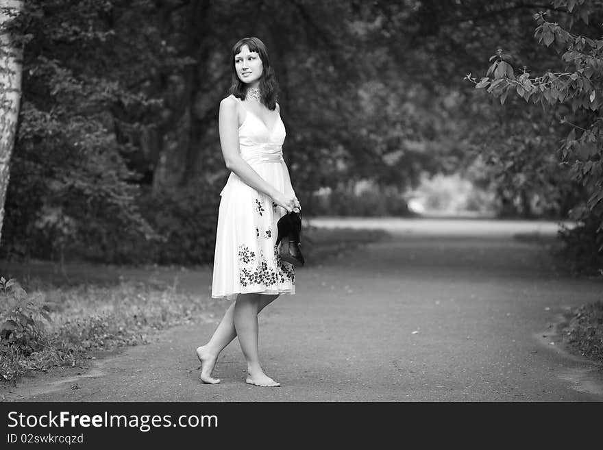 Portrait of naturally beautiful woman in her twenties, shot outside in natural sunlight