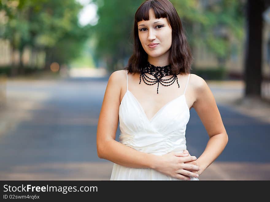 Portrait of naturally beautiful woman in her twenties, shot outside in natural sunlight