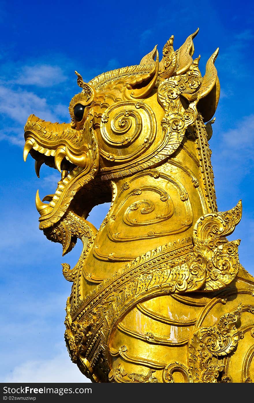 Statue of lion at Wat Phatatsutonmongkonkiri , Phrae Thailand. Statue of lion at Wat Phatatsutonmongkonkiri , Phrae Thailand