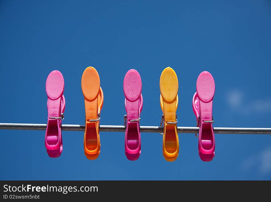 Pink And Orange Clothespins