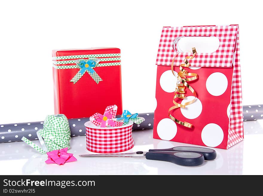 Wrapping paper bows and ribbons for decorating  the most beautiful gift isolated on white background