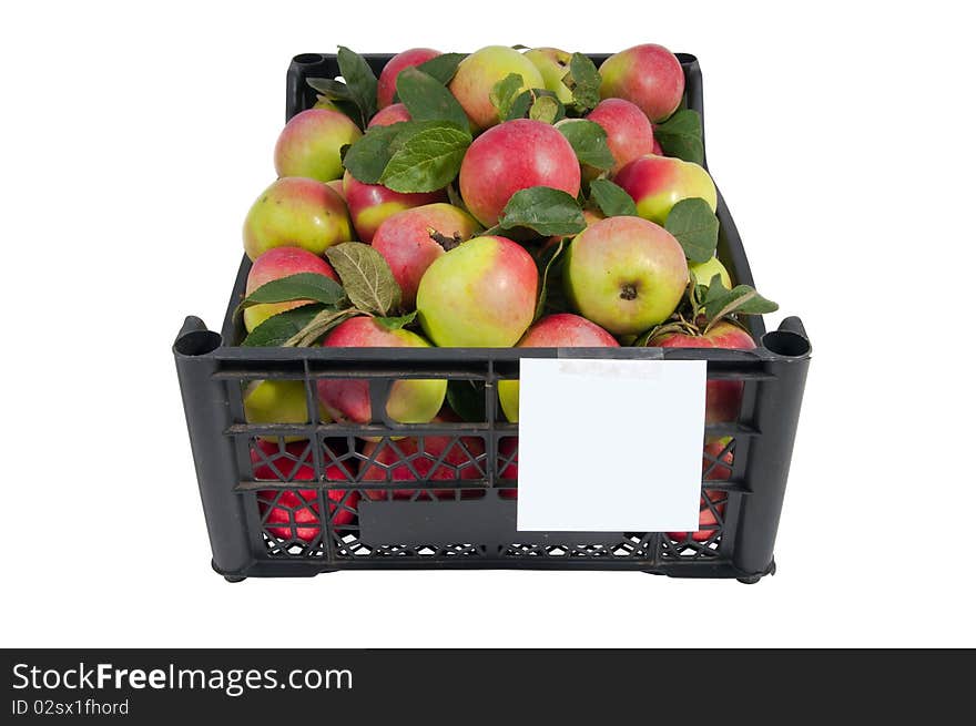 The box of absolutely natural red and green apples free of GMO pesticide herbicide bright  isolated on white. The box of absolutely natural red and green apples free of GMO pesticide herbicide bright  isolated on white