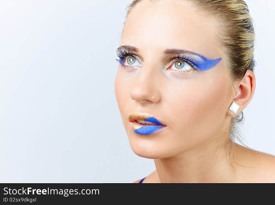 Model with art make up on white background. Model with art make up on white background