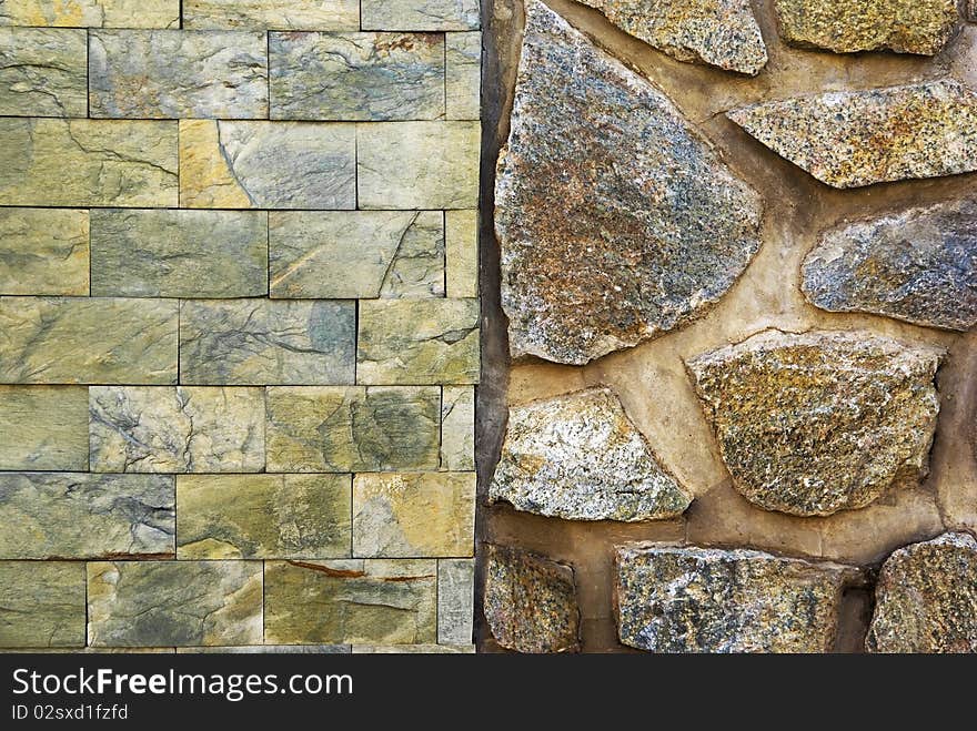 Stone wall. Single shot of house facade with different types of wall texture, bricked and stoned wall pattern. Stone wall. Single shot of house facade with different types of wall texture, bricked and stoned wall pattern.