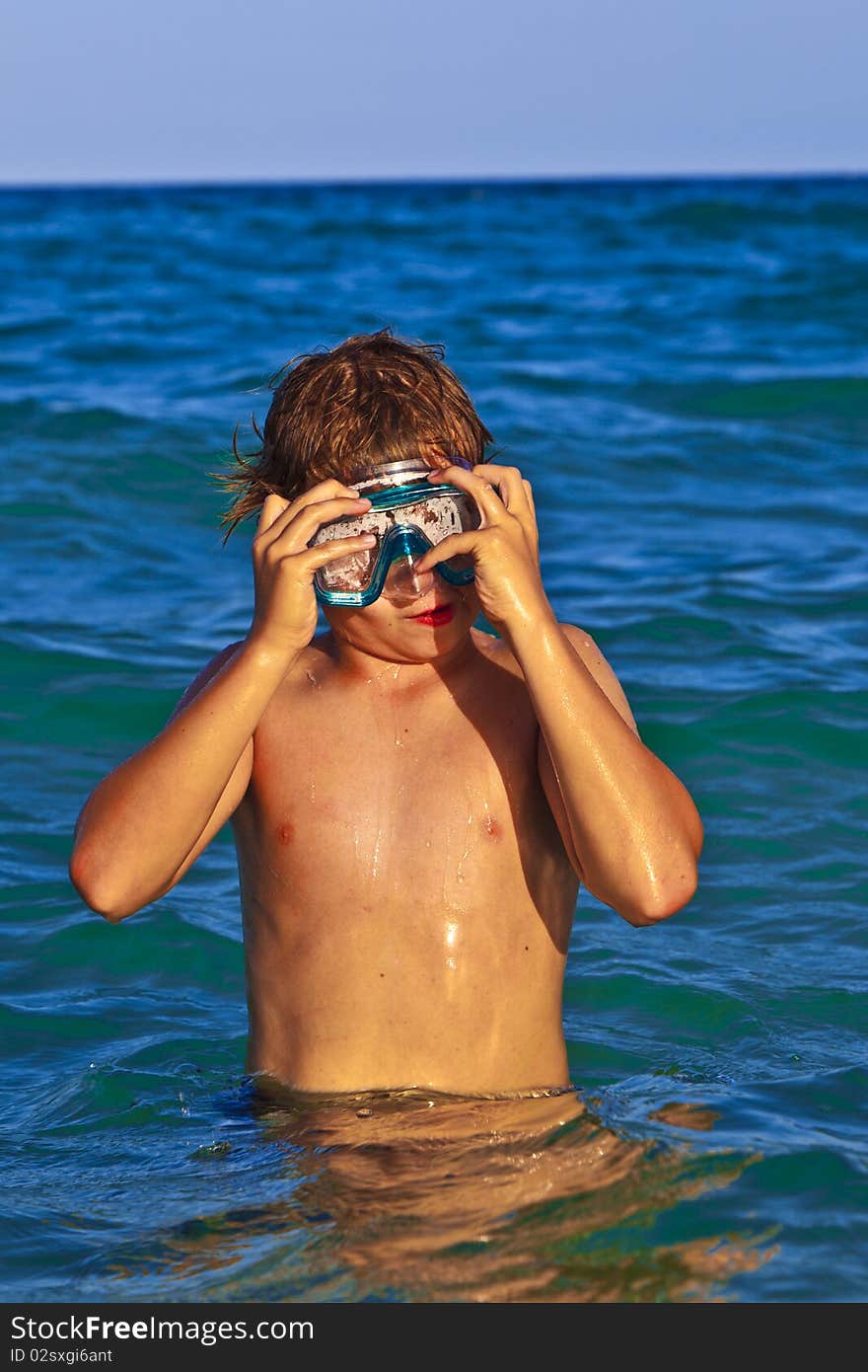 boy swimming in the sea