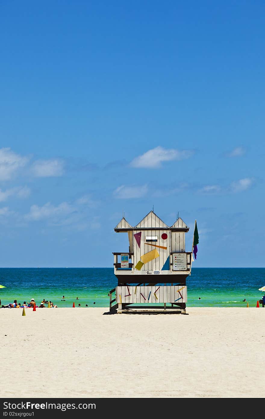 Miami Beach With People Enjoying The Ocean