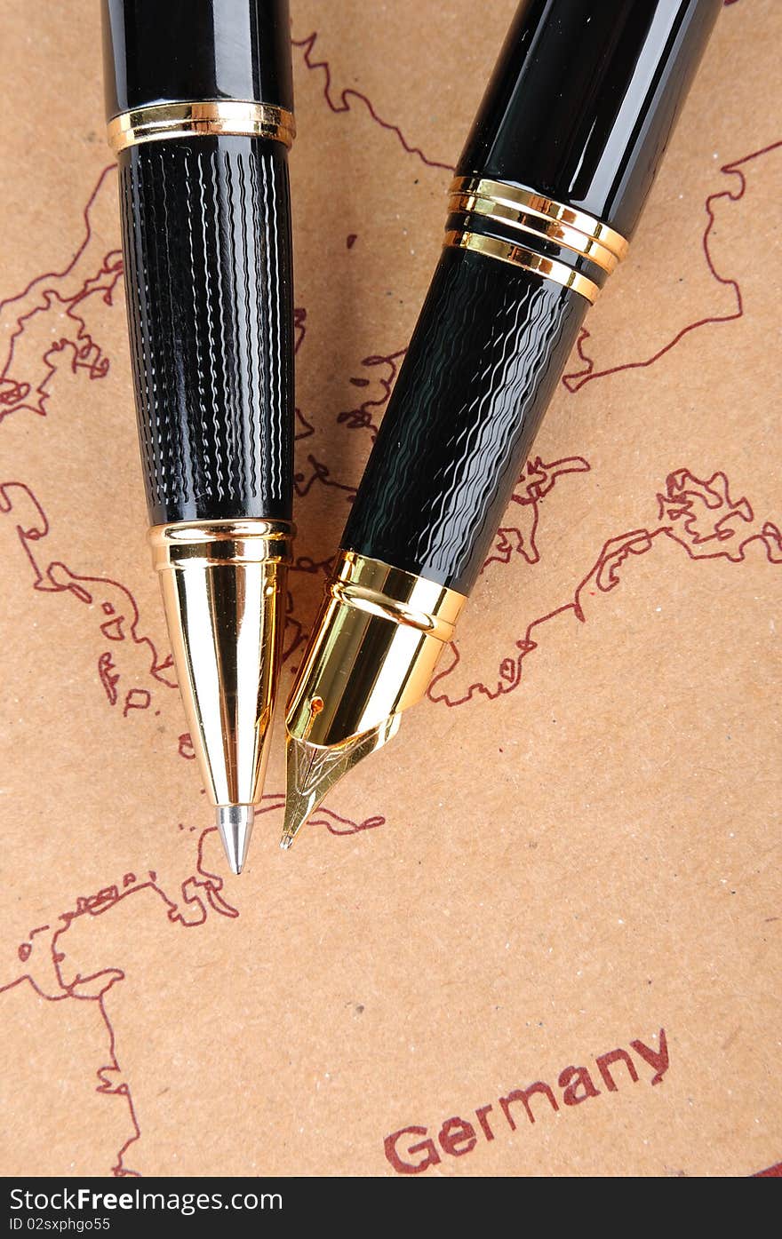 Two pens putting on a European map, means business and travel concept. Two pens putting on a European map, means business and travel concept.