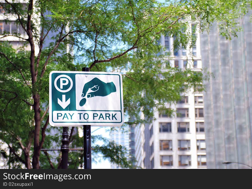 Pay to park sign