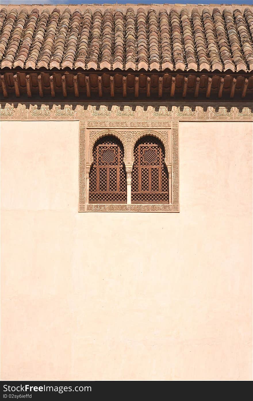 Windows of the Moorish Palace at the Alhambra, a landmark of the Arab culture in Spain. A great place (tower) for vacations. Windows of the Moorish Palace at the Alhambra, a landmark of the Arab culture in Spain. A great place (tower) for vacations.