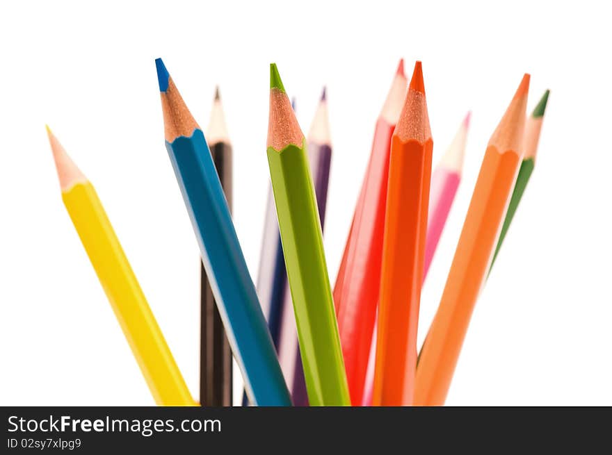 Close-up image of multicolor pencils isolated on white background