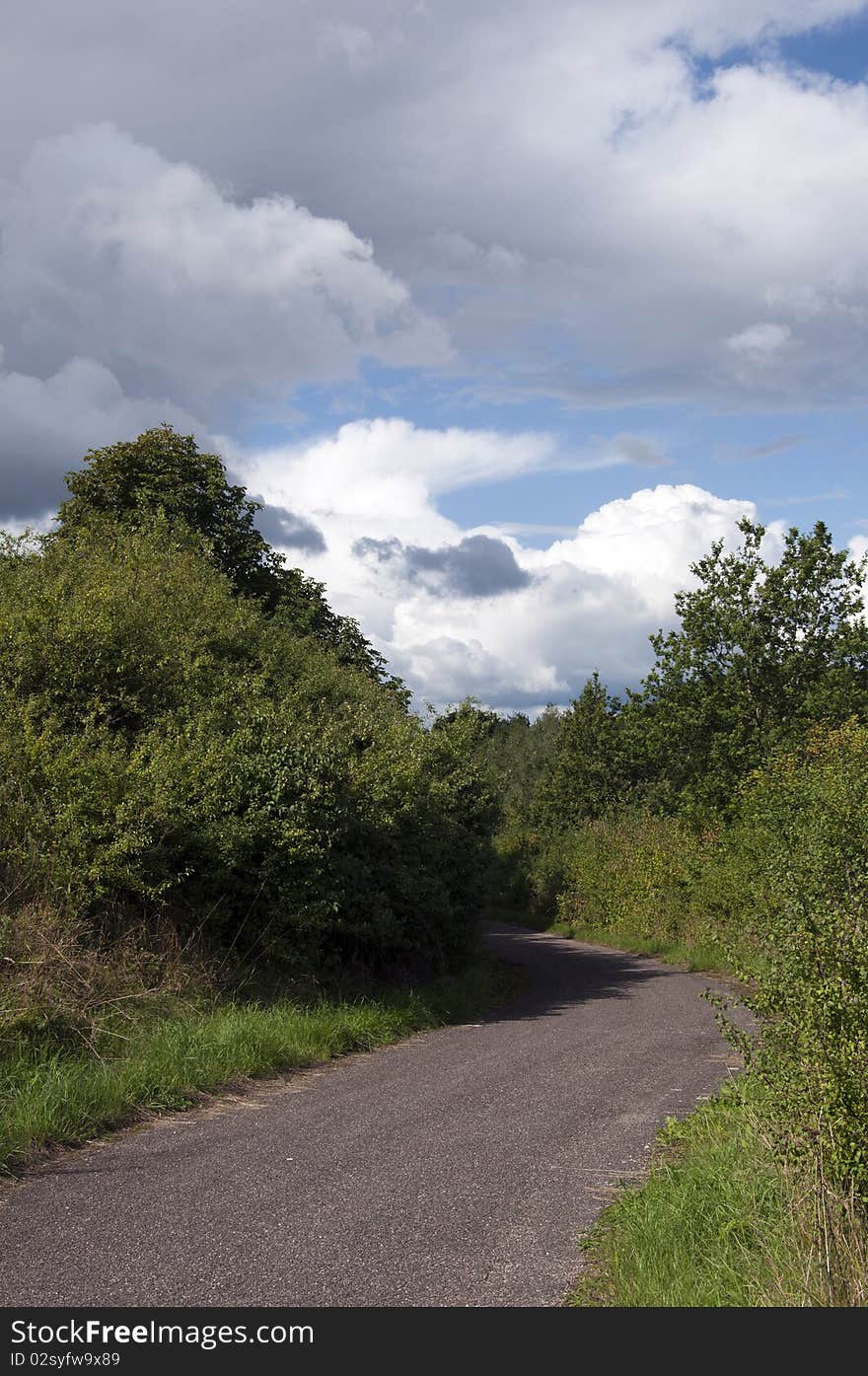 Storm clouds over a bike trail in Schleswig-Holstein - Germany