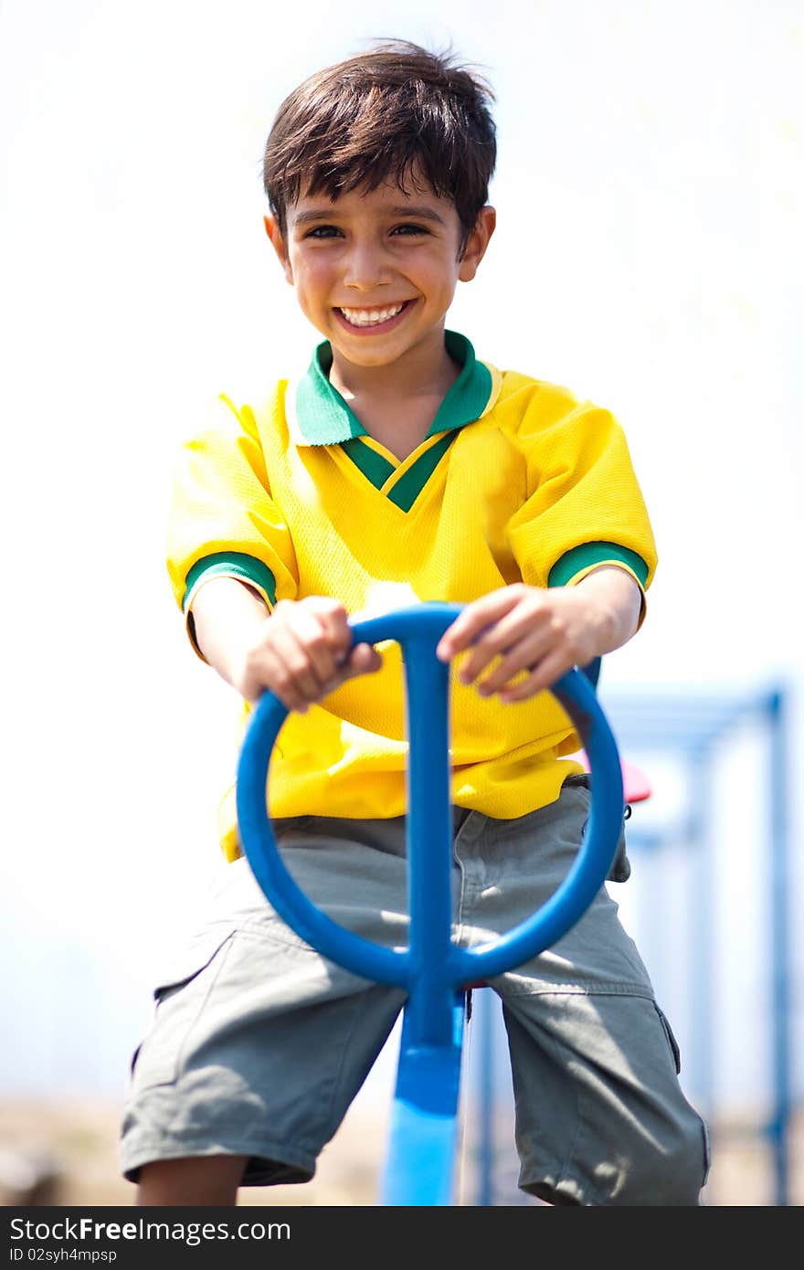 Young Kid Enjoying Swing Ride