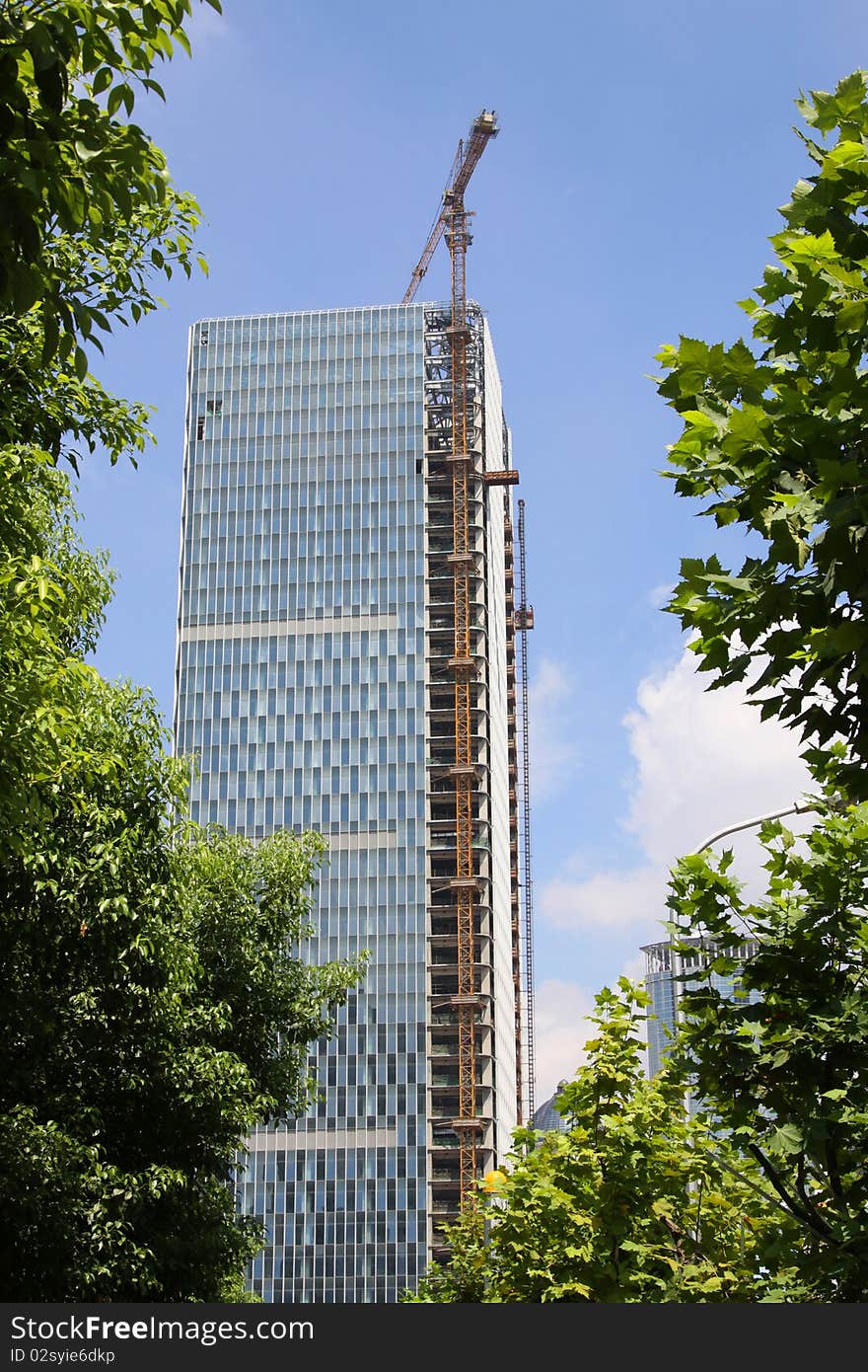 A modern tower toward the end of construction. A modern tower toward the end of construction