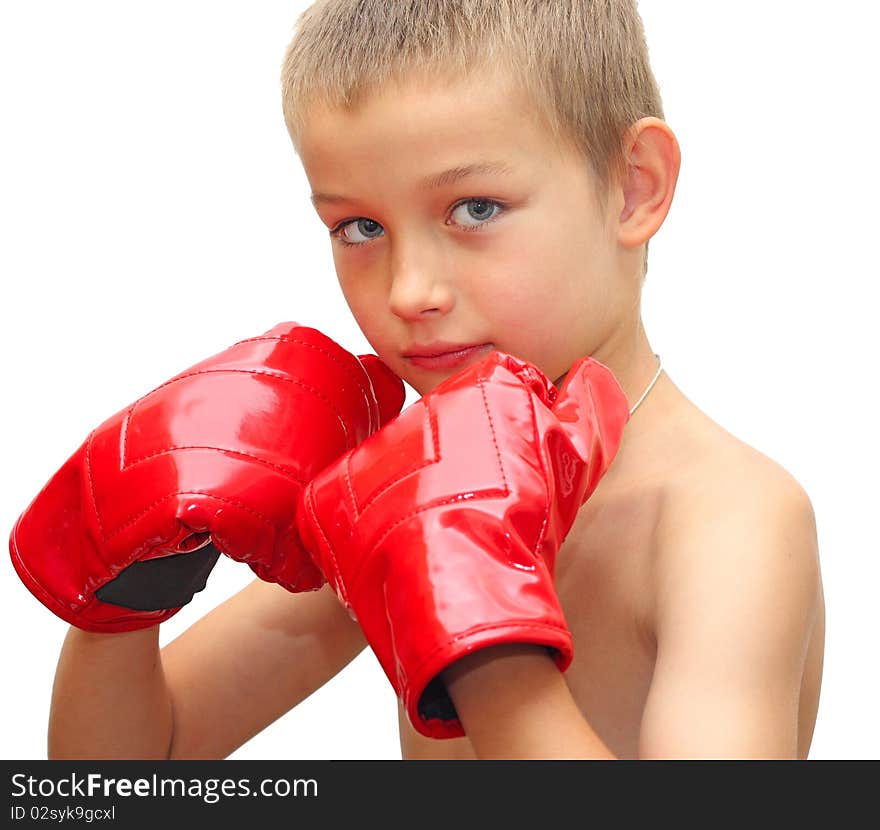 Young boy ready to box over white background