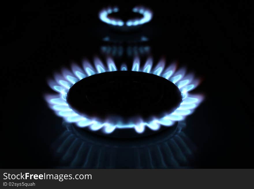 Close up of kitchen gas range with burning. Close up of kitchen gas range with burning..