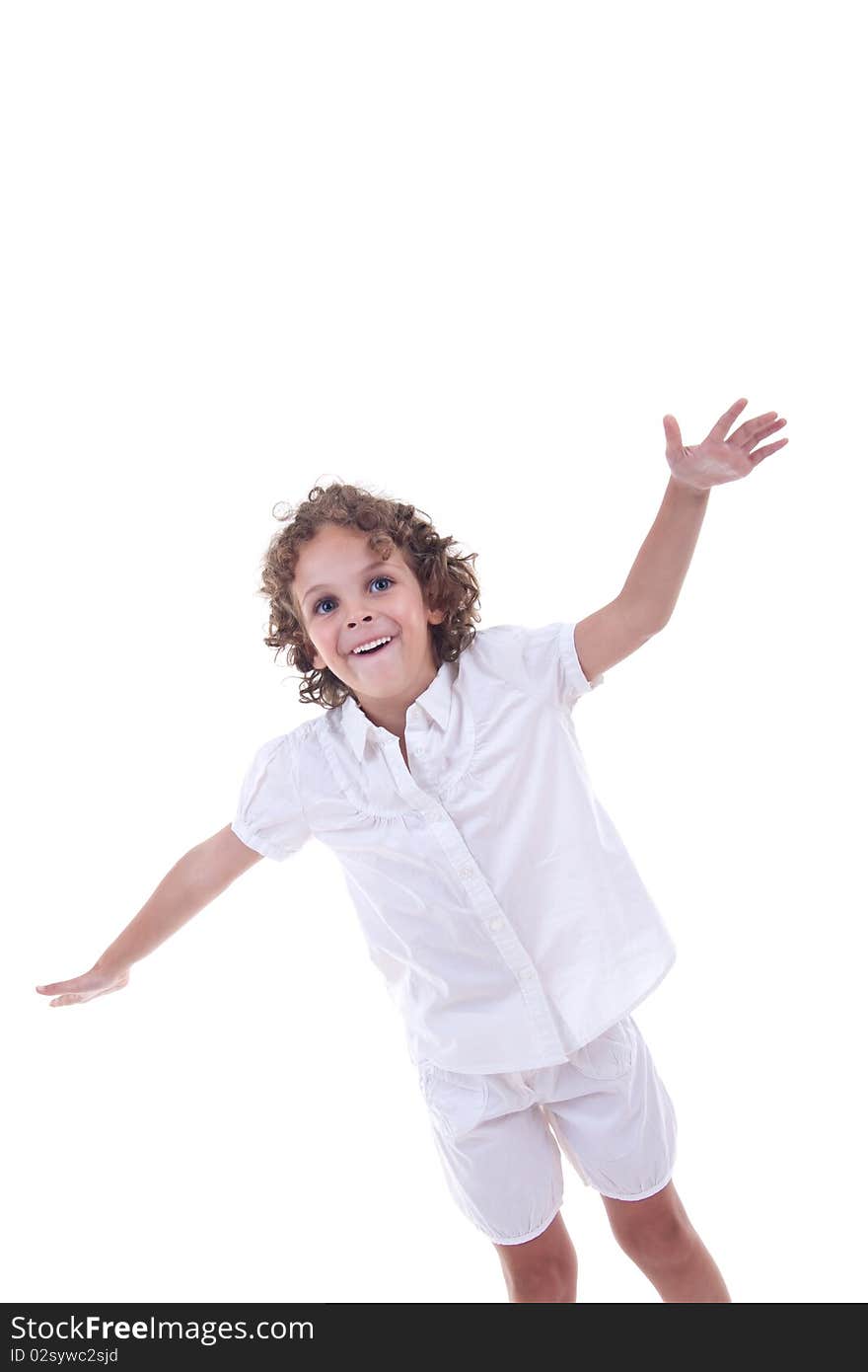 Little girl with hands in the air over white