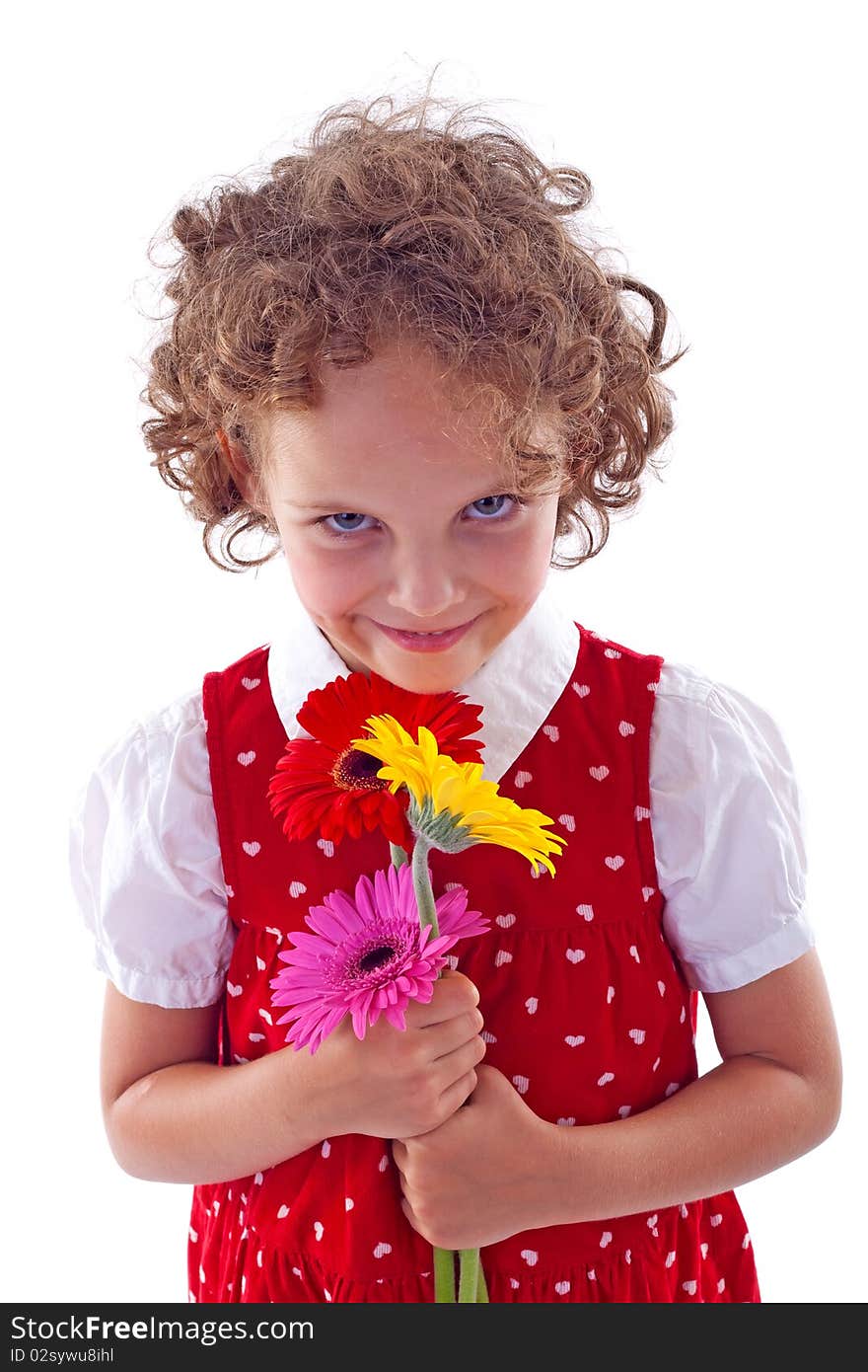 Cheerful little girl holding bunch of Gerabra flowers