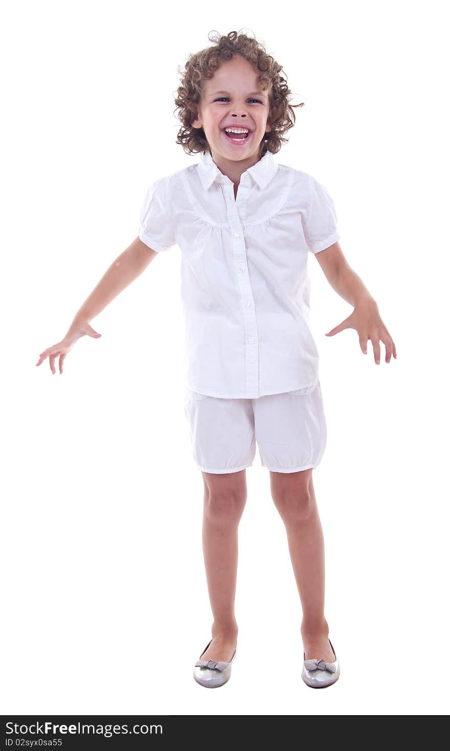 Casual little girl laughing on white background