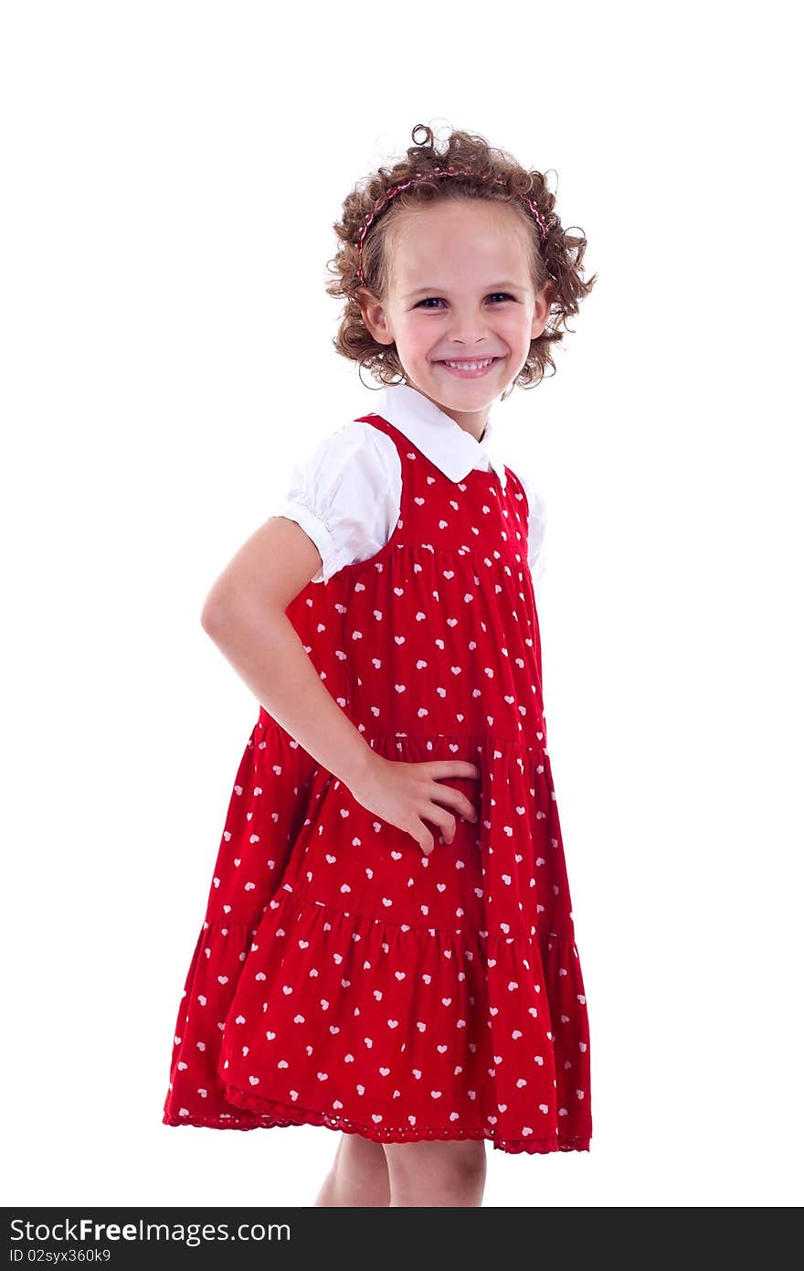 5 yeasr old girl wearing red dress. White background. 5 yeasr old girl wearing red dress. White background.