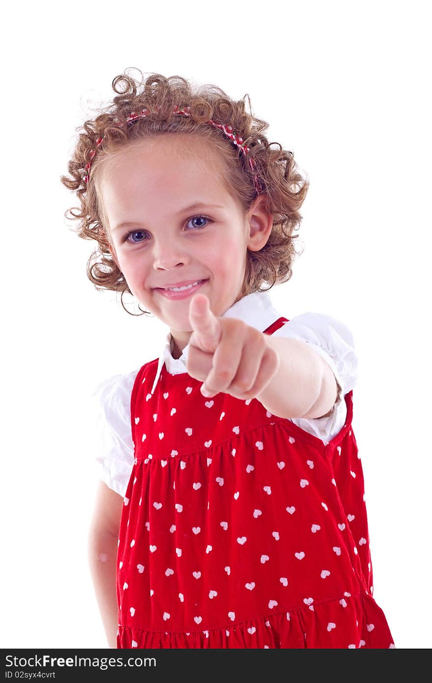 Picture of a little girl wearing a red dress pointing to the camera. Picture of a little girl wearing a red dress pointing to the camera