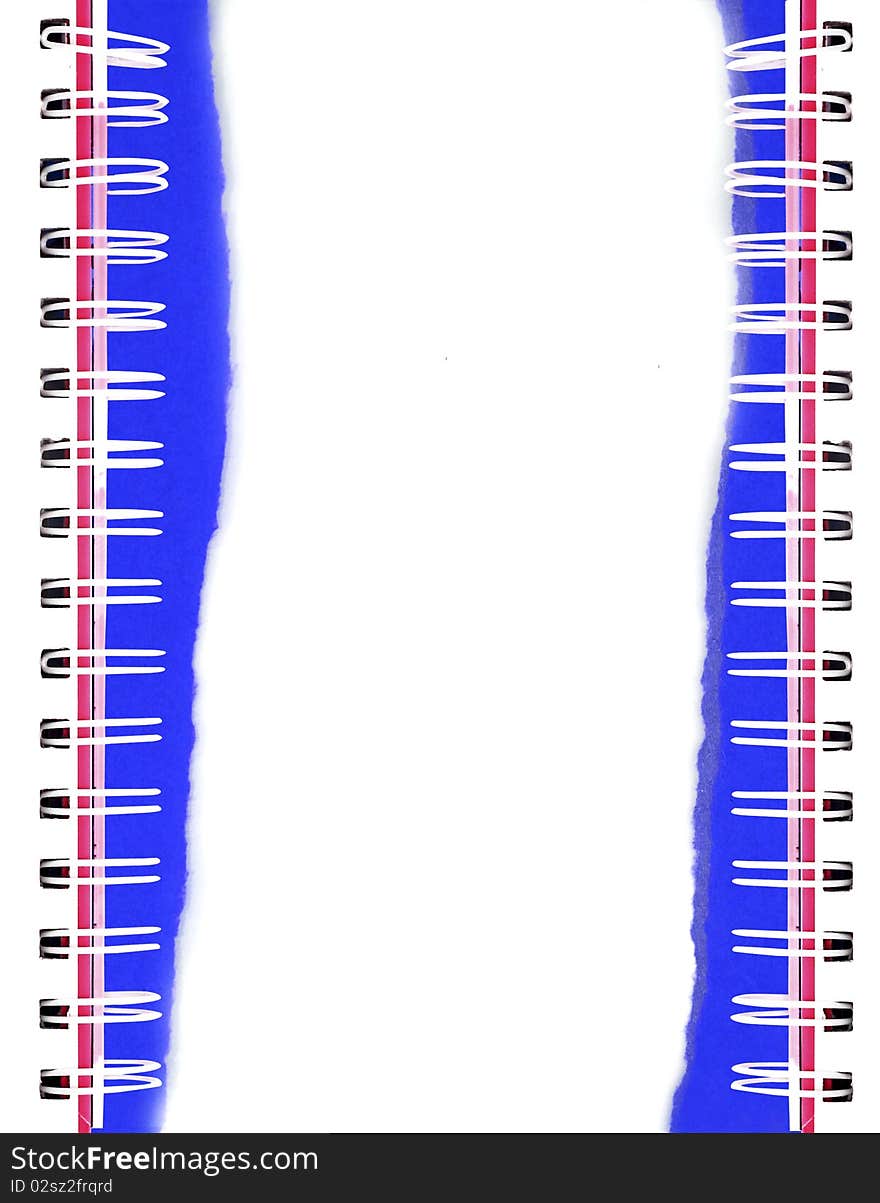 Closeup of a spiral notebook with binding dividing the frame diagonally. Closeup of a spiral notebook with binding dividing the frame diagonally