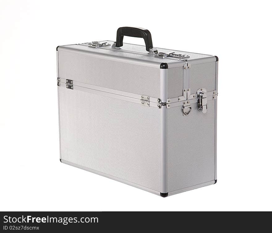 Aluminum suitcase shot in the studio. The suitcase is isolated in front of white background. Aluminum suitcase shot in the studio. The suitcase is isolated in front of white background.