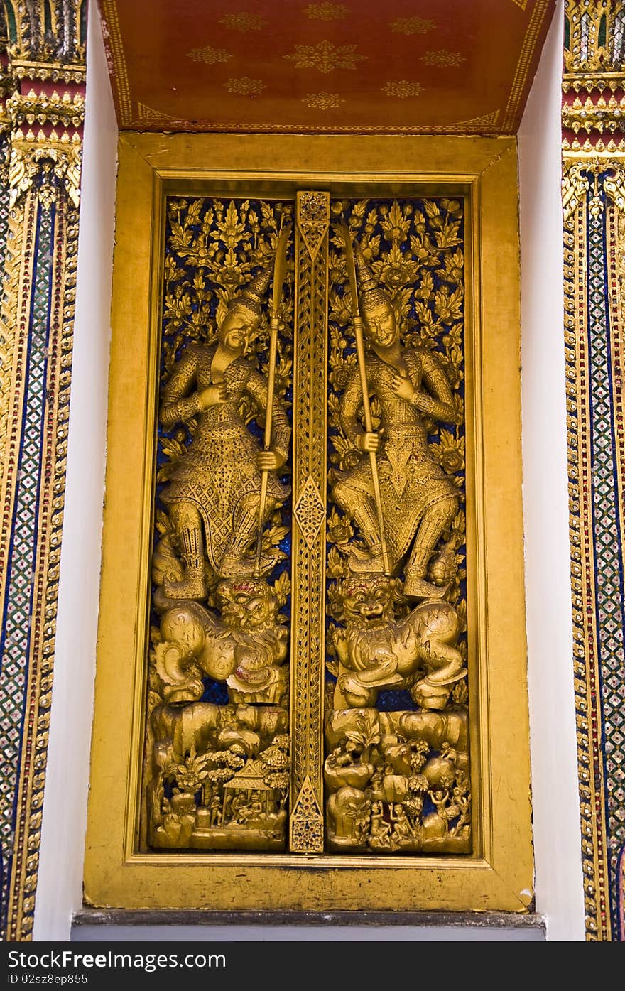 Story on the golden door at Wat Phra Kaeo. Story on the golden door at Wat Phra Kaeo