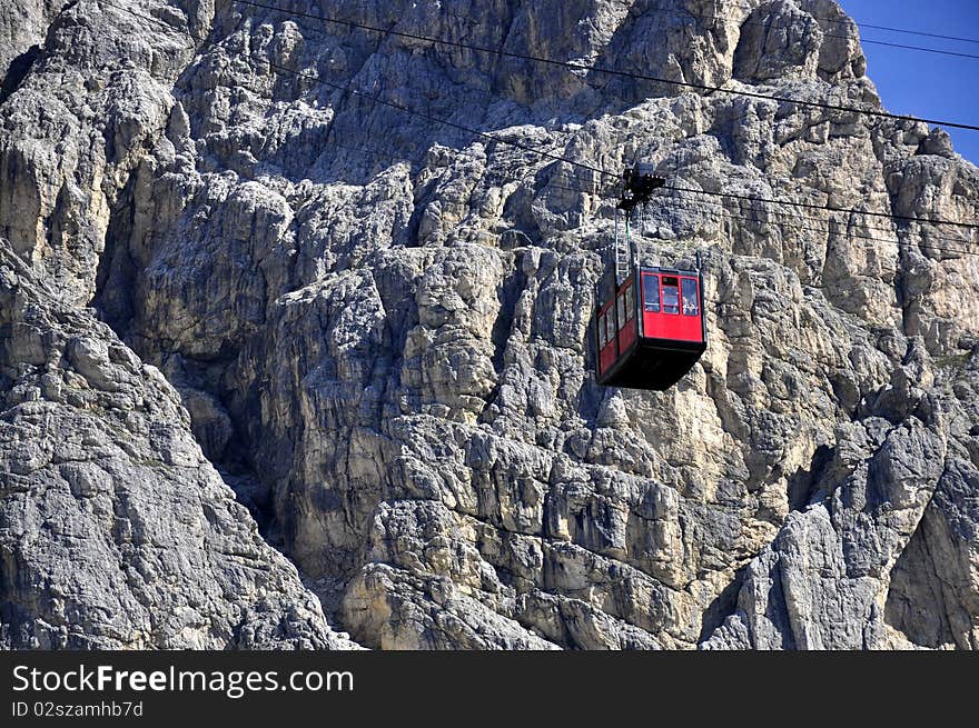 Large passenger lift from the mountain Paso Falzarego Rifugio Lagazuoi - Dolomites, Italy. Large passenger lift from the mountain Paso Falzarego Rifugio Lagazuoi - Dolomites, Italy.