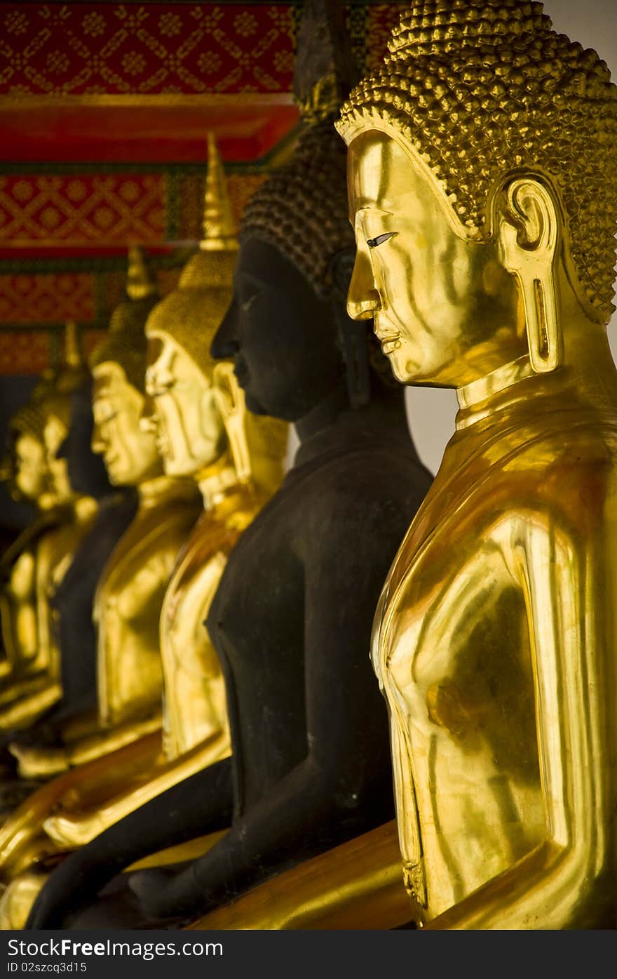 Golden image of Buddha in wat pho ,bangkok thailand