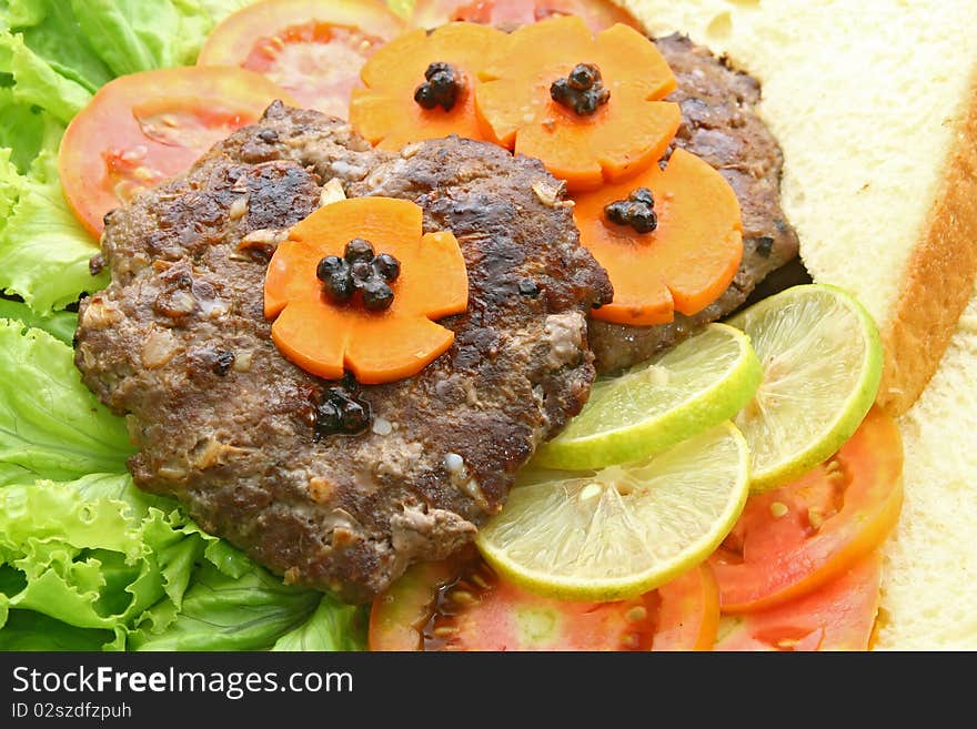 Grill Beef Hamburger with vegetable and bread, closeup