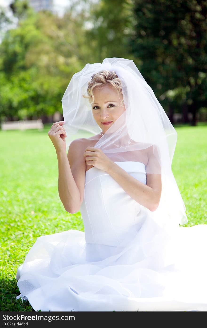 Young beautiful  bride outdoor