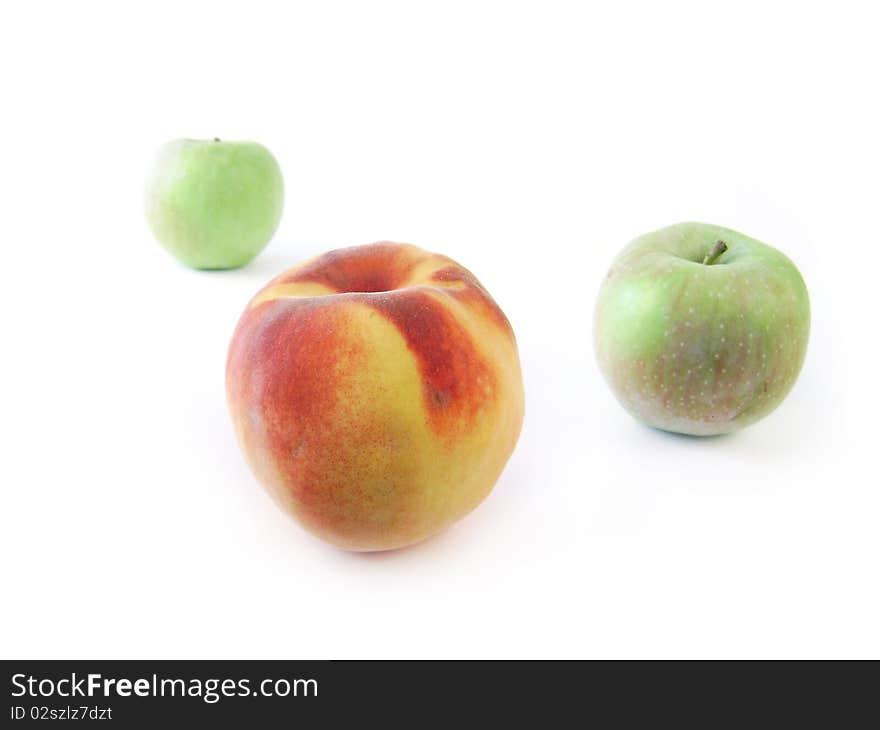 Apples and peach, isolated image