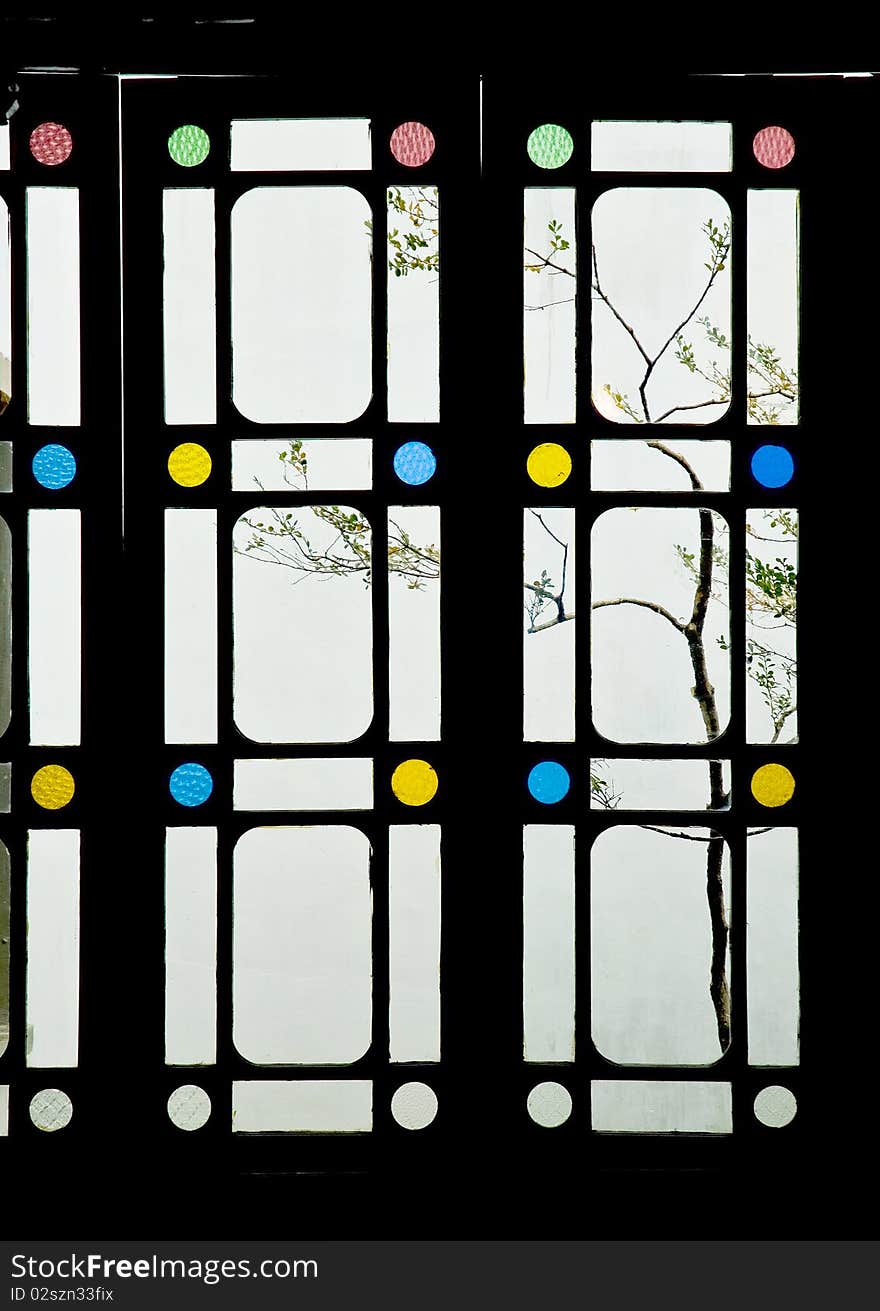 Looking outside of one of the most famous classical gardens:Shi Zi Lin(also named: Lion Grove Garden), which was built some 300 years ago in QING dynasty.Designated as World Cultural Heritage site by UNESCO.in Suzhou city, Jiangsu province, China. Looking outside of one of the most famous classical gardens:Shi Zi Lin(also named: Lion Grove Garden), which was built some 300 years ago in QING dynasty.Designated as World Cultural Heritage site by UNESCO.in Suzhou city, Jiangsu province, China.