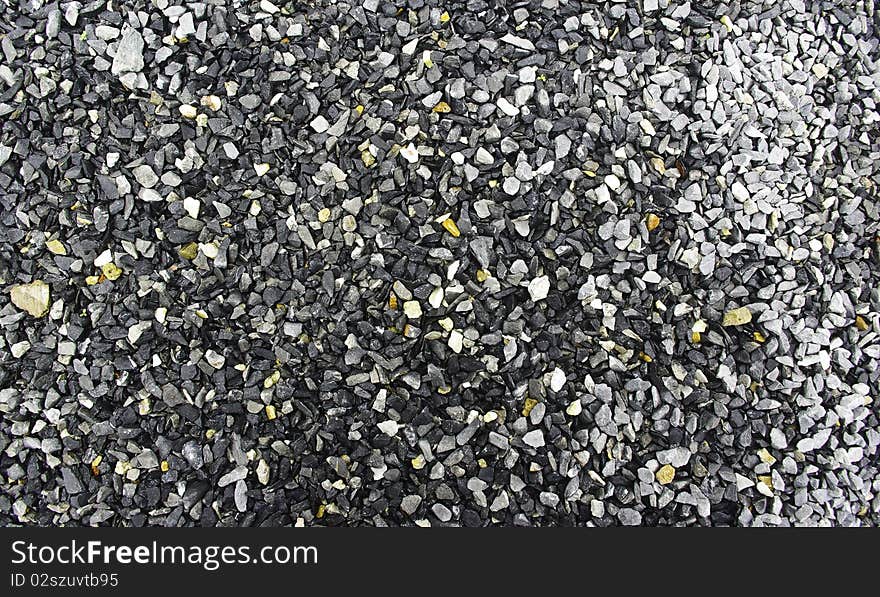 Small stone on ground, blue and white. Small stone on ground, blue and white