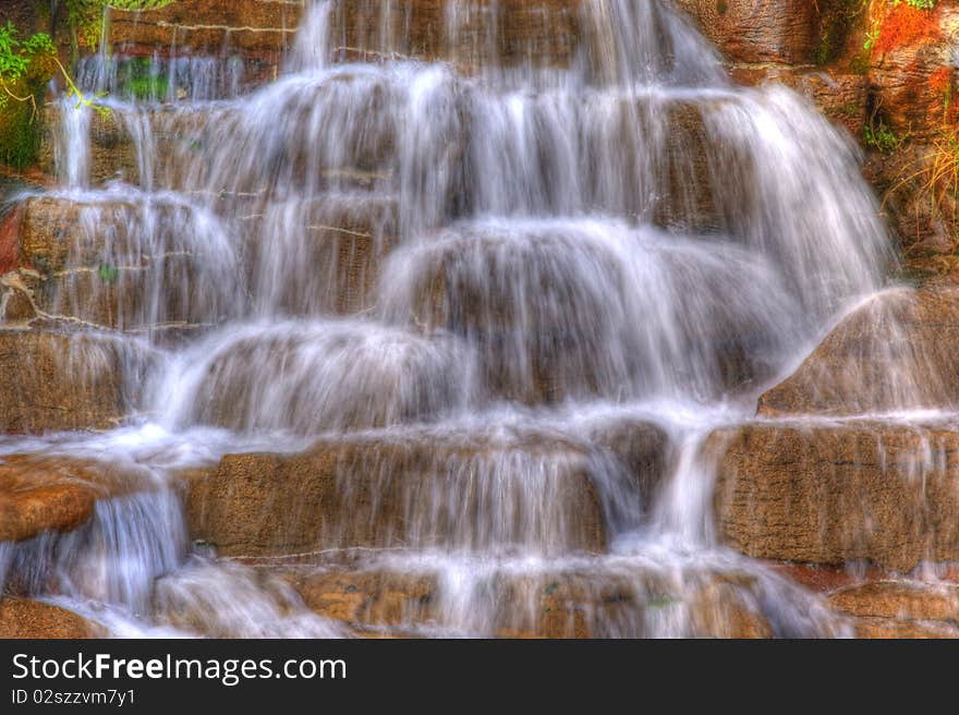 Water falls view in a park. Water falls view in a park