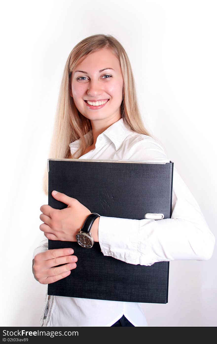 Young smiling business woman working with laptop