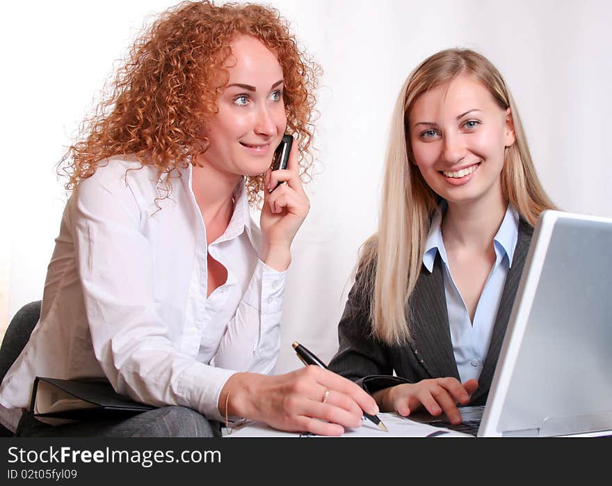 Businesswoman consulting a partner, working office