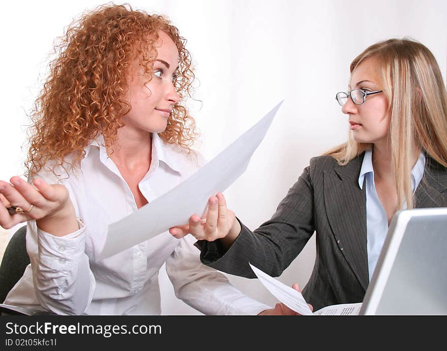 Businesswoman consulting a partner, working office