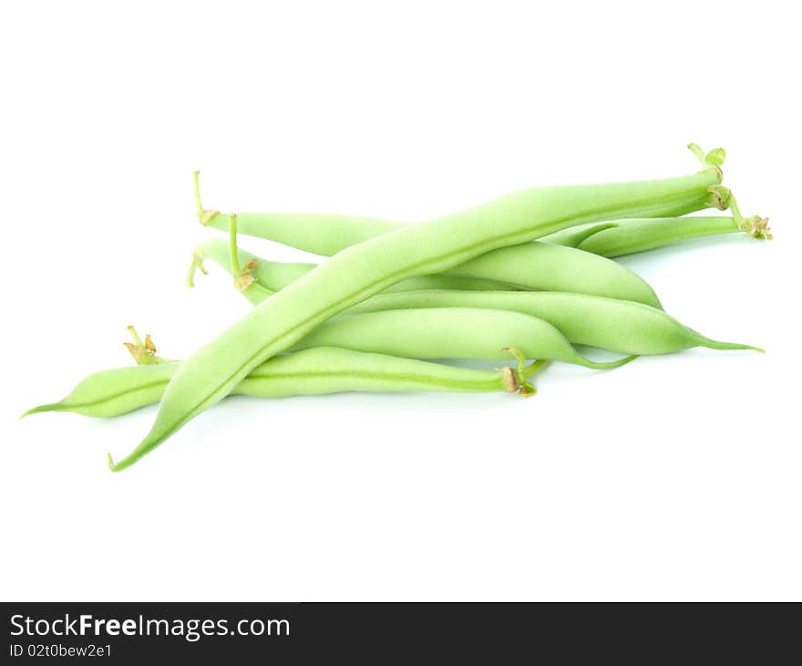 Fresh green peas on a white background