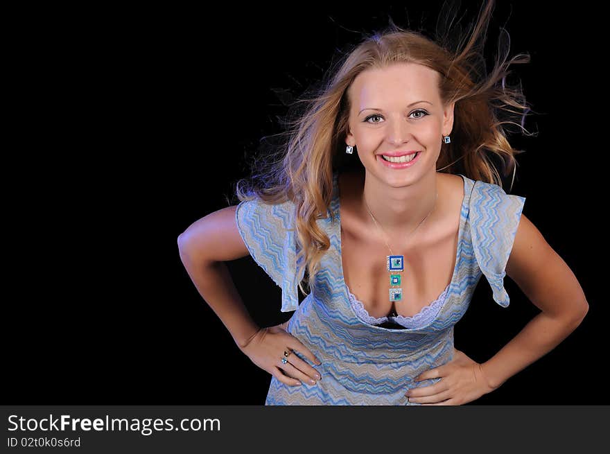 Portrait of a young girl on a black background