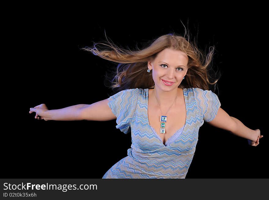 Portrait of a young girl on a black background