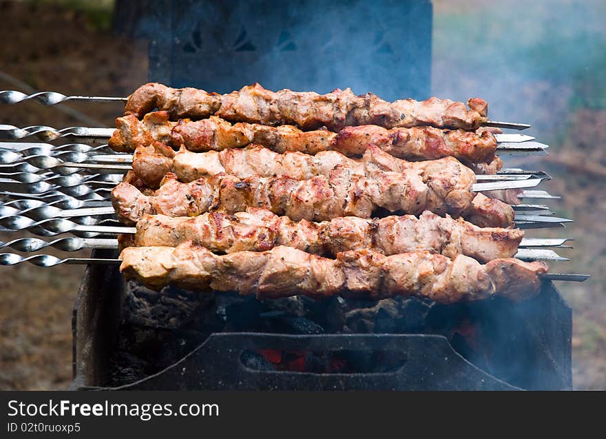 Pork barbeque on the grill. Pork barbeque on the grill