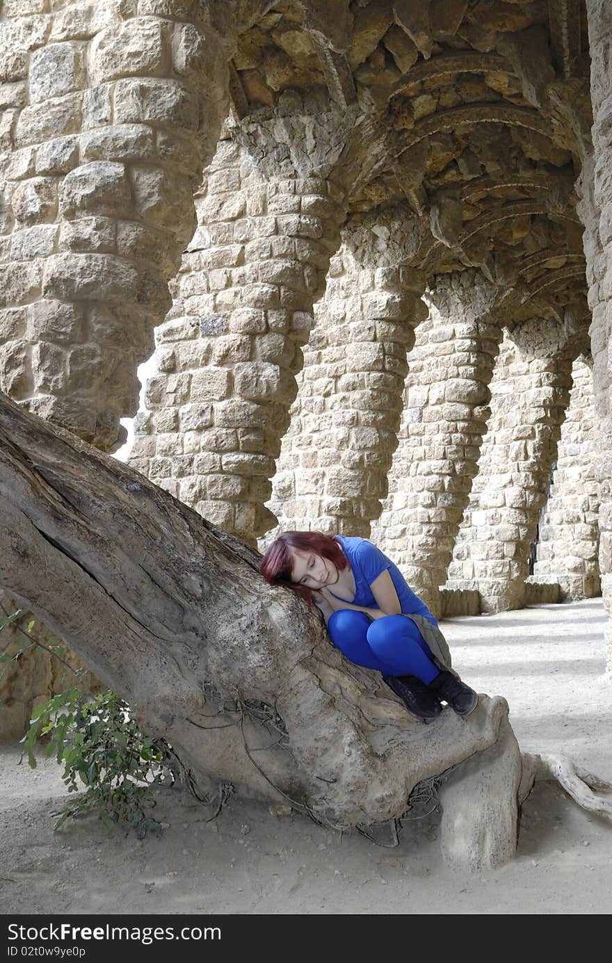 Girl lying on a tree im Barcelona / Spain