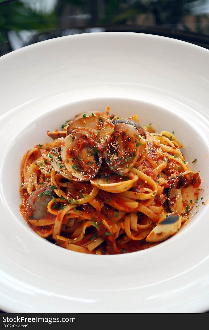 An italian meal called seafood spagetti on a plate