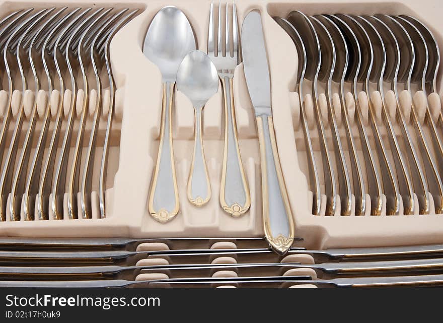 Tableware kit of stainless steel.