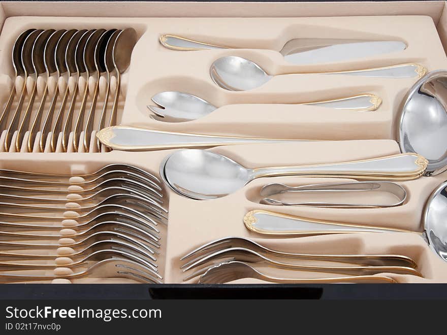 Tableware kit of stainless steel.