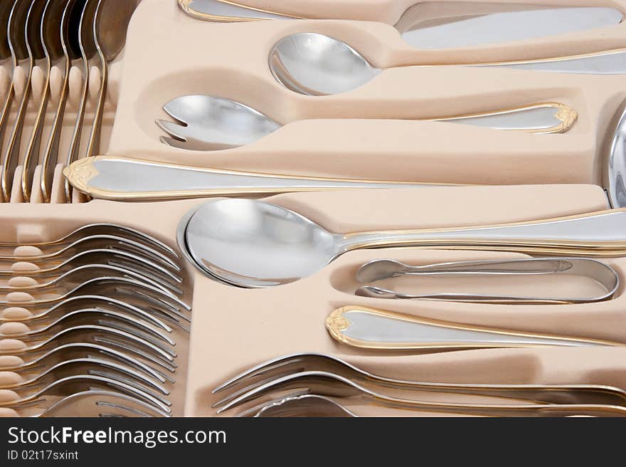 Tableware kit of stainless steel.